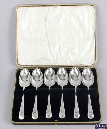 A cased set of six late Victorian silver teaspoons, plus a matched set of 12 silver rat-tail tea or coffee spoons with tongs.