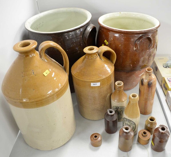 A collection of stoneware bottles