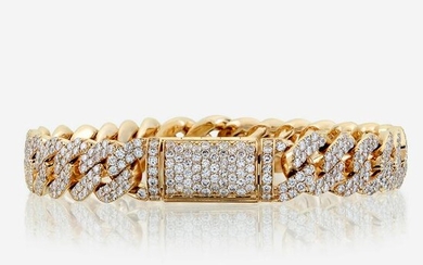 A diamond and fourteen karat gold bracelet