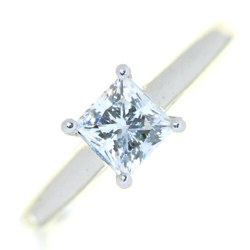 A diamond solitaire ring, with princess cut diamond, i...