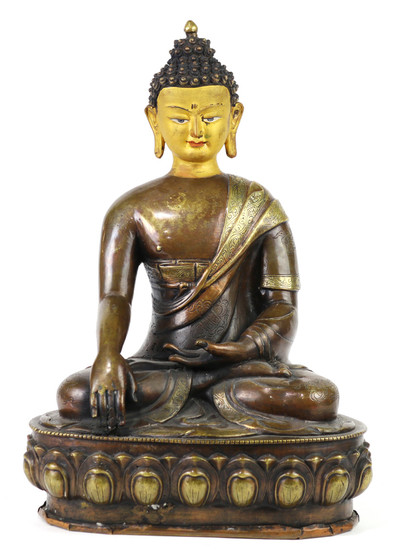 A gilt copper alloy figure of seated Buddha