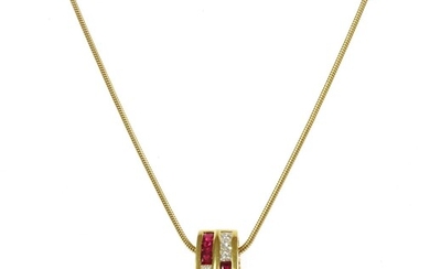 A gold ruby and diamond pendant
