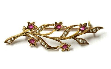 A gold ruby and split pearl spray brooch