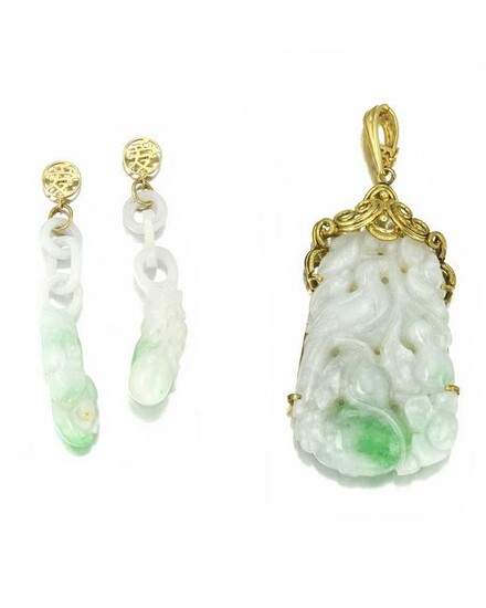 A group of carved jade jewelry items