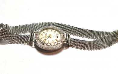 A lady's 18 carat white gold diamond set wristwatch, dial...