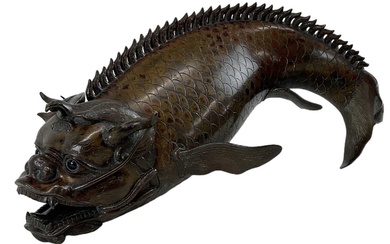 A late 18th/early 19th century Chinese bronze dragon carp censer,...