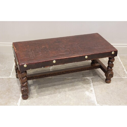 A leather topped South American table on barley twist suppor...