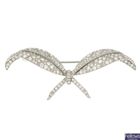 A mid 20th century platinum brilliant-cut diamond double leaf brooch.
