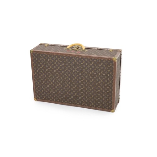 A modern Louis Vuitton Alzer 80 suitcase trunk, labelled LOU...