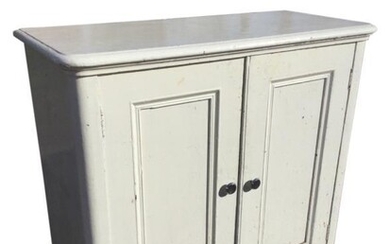 A painted Victorian cupboard with moulded top above panelled...