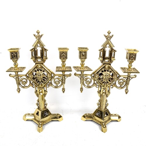 A pair of 19th century polished brass Gothic style twin-bran...