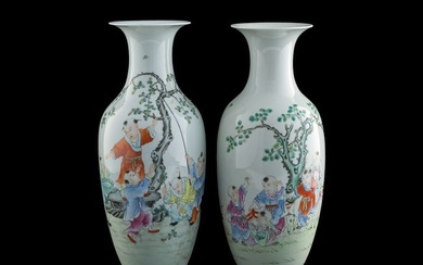 A pair of Chinese famille rose 'children playing' vases, Republic period