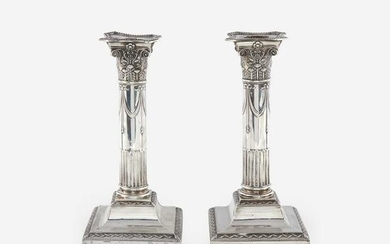 A pair of Edward VII weighted sterling silver