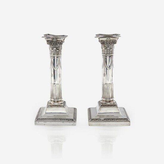 A pair of Edward VII weighted sterling silver