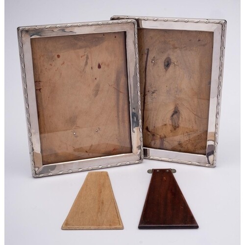 A pair of George V silver photograph frames, maker William N...