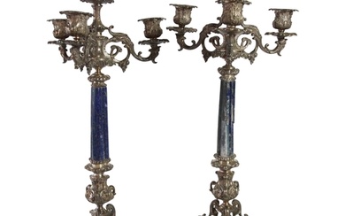 A pair of elaborate Italian silver four light candlesticks h...