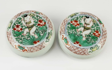 A pair of famille verte low circular boxes with boy pattern