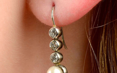 A pair of pearl and old-cut diamond collet earrings.