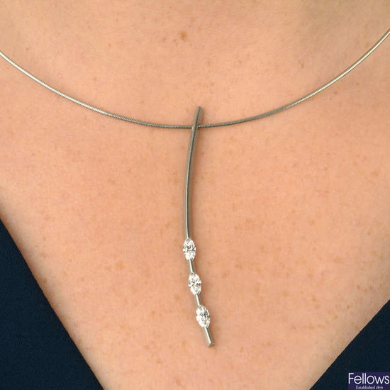 A platinum diamond pendant, on chain, by Paul Spurgeon.