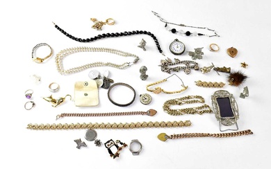 A quantity of costume jewellery to include a silver cased...