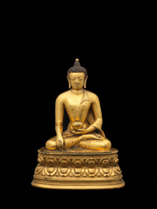 A rare gilt-copper-alloy figure of Buddha Shakyamuni
