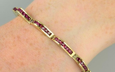 A ruby bracelet, of undulating wave form. Stamped