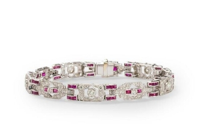 A ruby, diamond and eighteen karat white gold bracelet