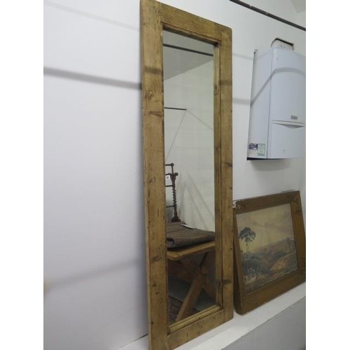 A rustic pine mirror, 181cm x 62cm