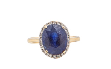 A sapphire and diamond cluster ring Within a small bri...