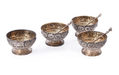 A set of four Victorian Scottish silver circular salts by Hamilton & Inches