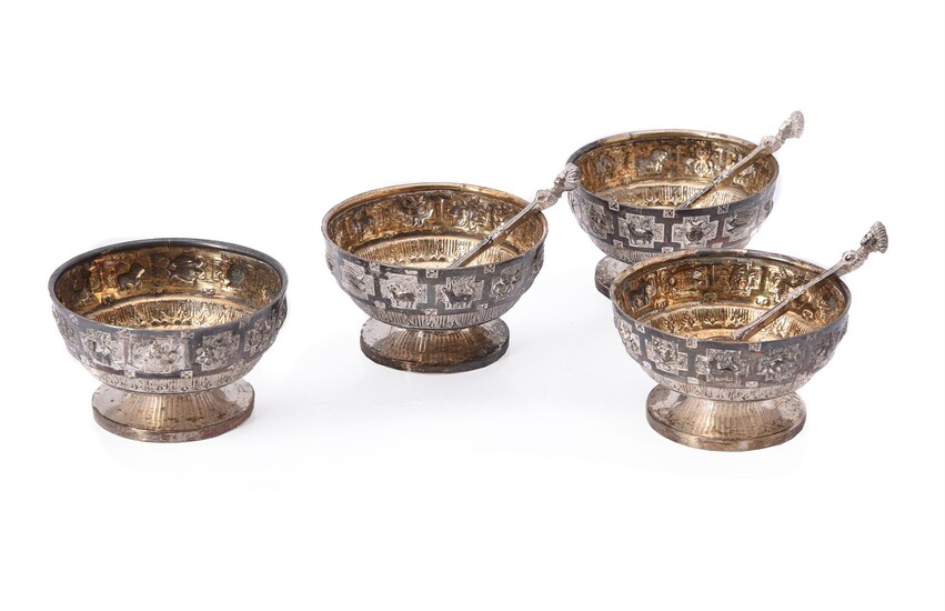 A set of four Victorian Scottish silver circular salts by Hamilton & Inches