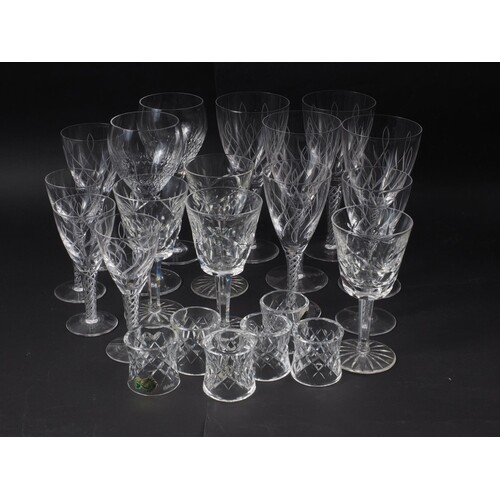 A set of four Waterford wine glasses, a set of four Stuart C...