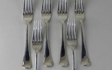 A set of six Edward VII silver Old English pattern dessert forks