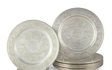 A set of twelve American sterling silver bread plates