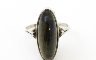 A silver ring set with cabochon. Ring size approx. S Please Note - we do not make reference to the
