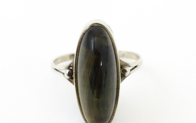A silver ring set with cabochon. Ring size approx. S