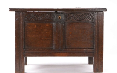 A small Charles II oak coffer, Devon, circa 1660, having a twin-panelled lid and front, and a