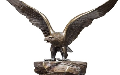 A small table eagle on a stone base, 20th century