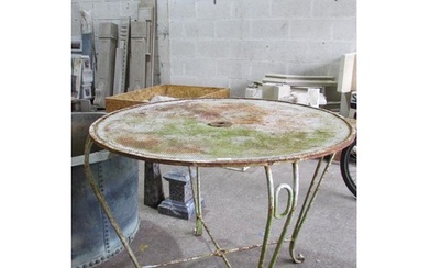 A weathered rustic painted metalwork patio / garden table, w...