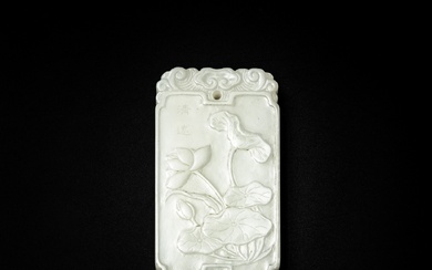 A white jade 'lotus' plaque, Qing dynasty | 清 白玉蓮蓬紋珮