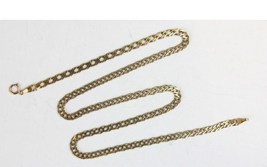 A yellow metal chain, the double curb link chain with bolt r...