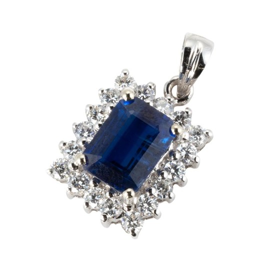 AN 18CT WHITE GOLD KYANITE AND DIAMOND PENDANT; step cut kyanite of 1.73ct to surround of 18 round brilliant cut diamonds totalling...