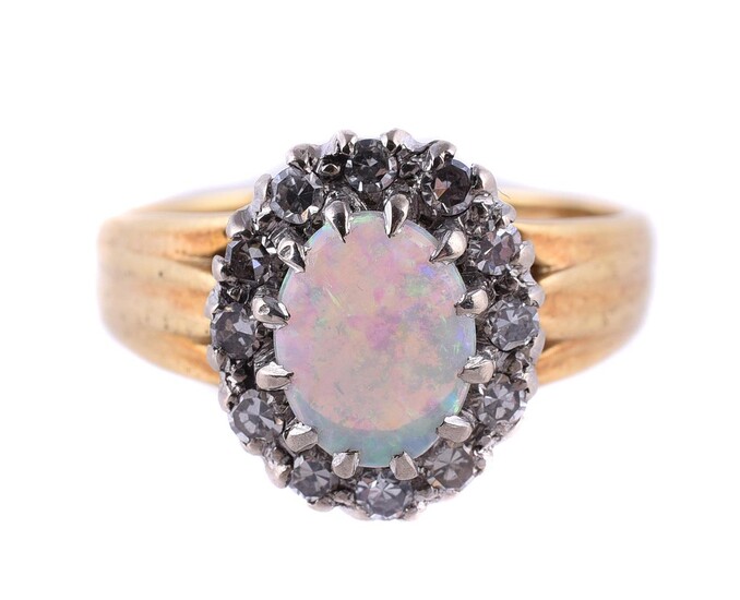 AN OPAL AND DIAMOND CLUSTER RING, LONDON 1970