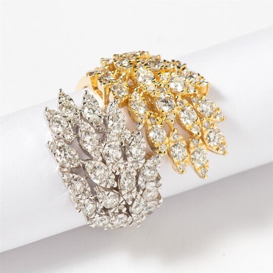 (-), An 18 carat white and yellow gold...