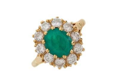 An 18ct gold emerald and diamond cluster ring, estimated tot...