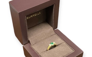 An 18ct yellow gold emerald and diamond set ring, size...