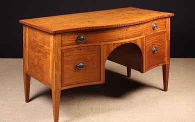 An Edwardian Serpentine Front Satinwood Sideboard/Dressing Table bordered with diagonally grained ba