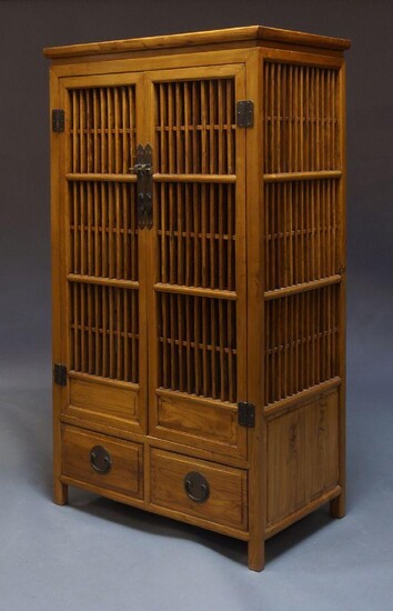 An Edwardian mahogany music cabinet, with six drawers on cabriole type legs to raised pad feet, 92cm high, 50cm wide, 40cm deep