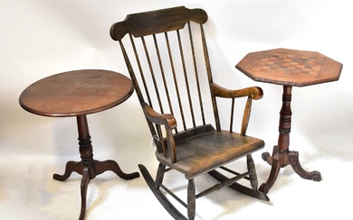 An Edwardian stained wooden rocking chair on turned supports, together...
