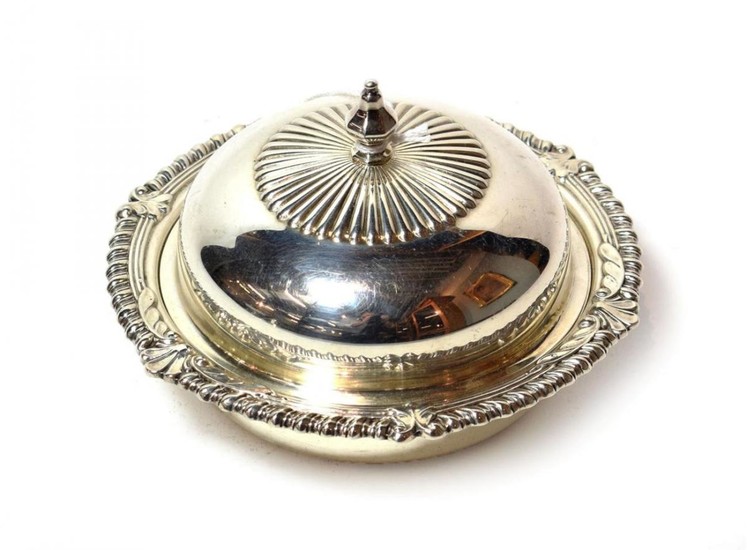An Elizabeth II silver butter-dish, cover and liner, by C....